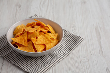 Homemade Cheese Tortilla Chips in a Bowl, side view. Copy space.