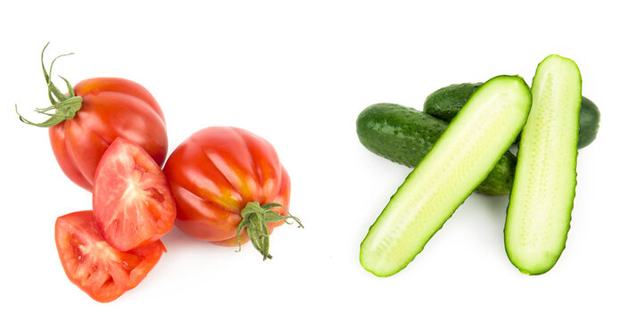 Ripe tomatoes and cucumbers isolated on white . Collage. Wide photo. Free space for text.