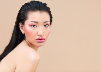 Beauty portrait of young attractive asian woman with bright make up