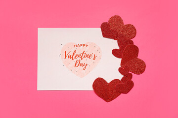 Card with text HAPPY VALENTINE'S DAY and hearts on pink background
