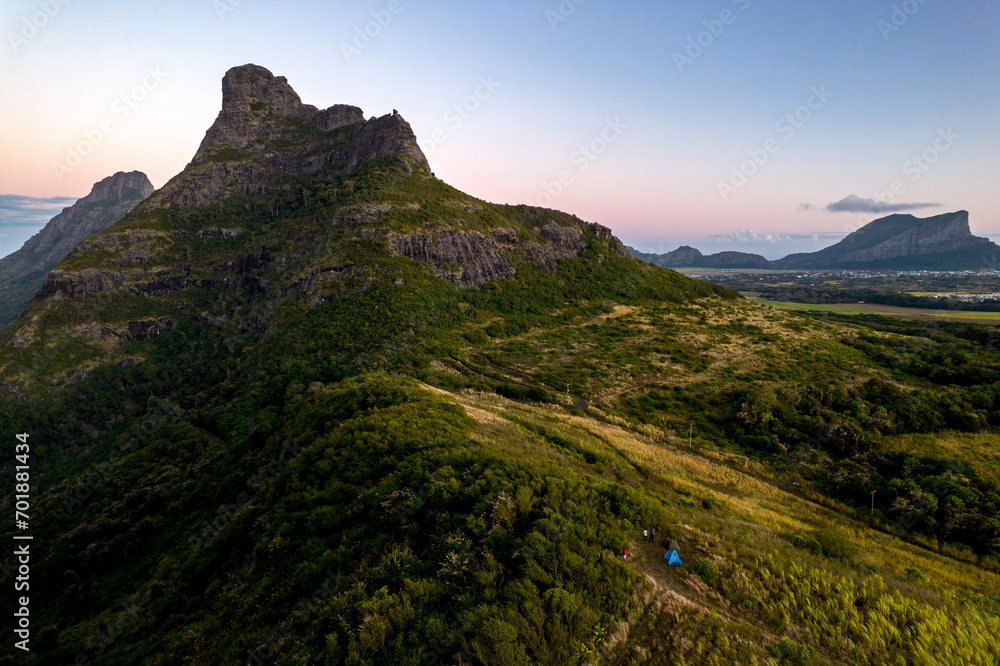 Wall mural aerial view of trois mamelles mountain during sunrise in mauritius