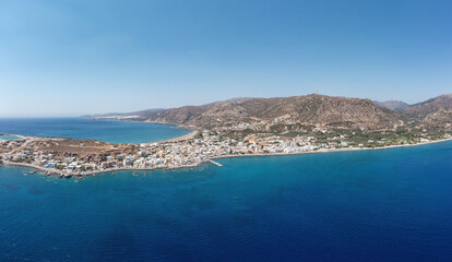 Palaiochora town, Crete island Greece. Aerial drone panoramic view of sea water, seaside building.