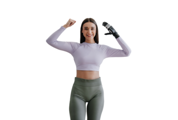 Handicapped young woman standing  at home, with  bionic hand prosthesis, smiling, bending hands showing muscles. Attractive disabled girl doing morning workout starting day, with plant at bedroom.