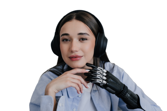 Cyte brunette girl with biomechanics hand in headphones listening music looking at camera in light blue shirt. Calm girl with disability touching her hand prosthesis by another hand. Limb prosthesis.