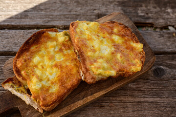 French toast  and white cheese. Rustic breakfast  made from deep fried   bread   with organic free range   eggs