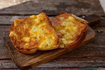 French toast  and white cheese. Rustic breakfast  made from deep fried   bread   with organic free range   eggs
