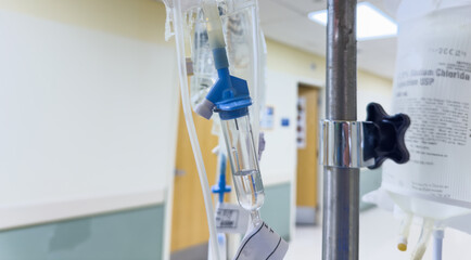 hospital IV drips, medical treatment concept, with selective focus and blurred background