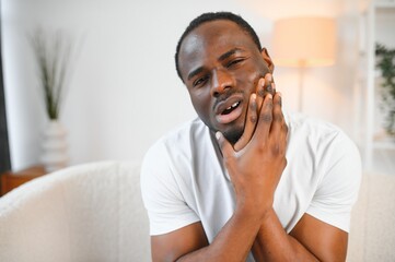 African American With Sore Tooth Decay. Dental Oral Health