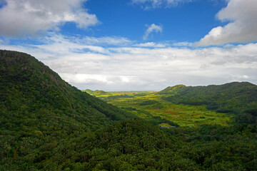 Aerial view of hills and the south east coast of Mauritius island
