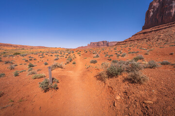 hiking the wildcat trail in monument valley, arizona, usa