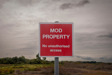 MOD Property, No unauthorised access sign in the countryside.