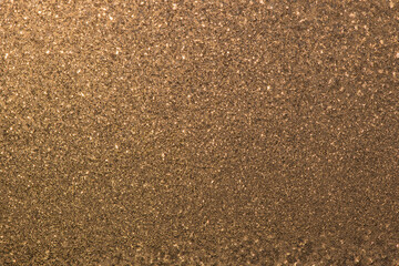 Pattern of ice gold frost on the glass of window. Winter background ant texture. Close up