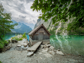 Berchtesgaden wooden shed at lake which show a nature reflection