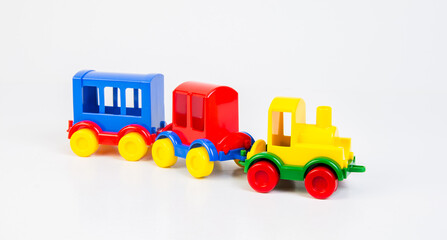 Plastic toy steam locomotive with carriages