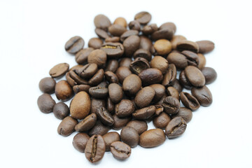 Fresh coffee beans on a white background