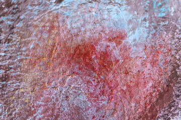 Leather texture with red-blue-brown tones used as a classic background.