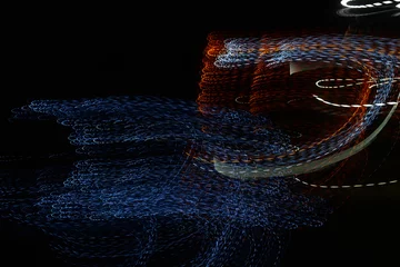 Fotobehang Random trajectories of light. Digital chaos. Chaotic beams of light. Digital flow illustration. White, blue, orange glowing lines. © Cocodrillo Giallo