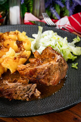 Stewed pork neck in sauce.