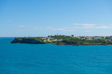 Fototapeta na wymiar St. David's Lighthouse on St. David's Island, viewed from the sea, Bermuda. 