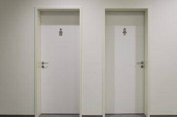 Doors of women's and men's toilets in office