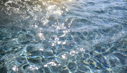 background of the blue sea water surface with sun rays and lens flare - obrazy, fototapety, plakaty