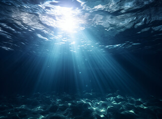 Fototapeta na wymiar beautiful abstract blue ocean background with underwater scene with rays of light, sun rays and bottom 