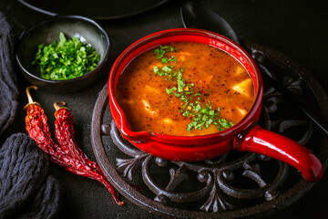 Hungarian hot goulash soup, beef, tomato, pepper, chili, smoked paprika soup. Traditional Hungarian...