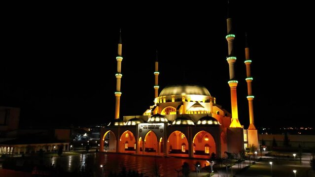 Images of a magnificently illuminated mosque in the evening
