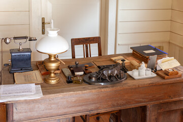 Ancient desk, full of stuff for the boss job, village elder's old office