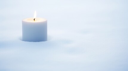 Obraz na płótnie Canvas The simplicity of a single candle surrounded by untouched snow, creating a minimalistic yet breathtaking image.