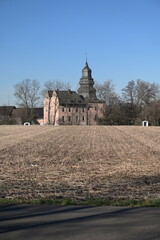 Old manor house with slate tower called Gut Dyckhof in Meerbusch, Germany