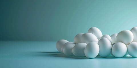 Minimalistic Easter banner with white eggs on a blue background.