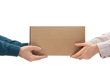 Male hands giving a package, female hands receiving a package. Purchase delivery concept, Parcel...