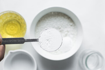 A spoon of baking soda or baking powder