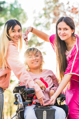 Inspire inclusion feminist equality and diversity heart love symbol. Group with cerebral palsy woman
