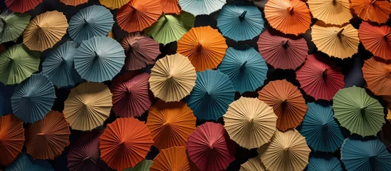 Fotobehang Seen from above, the background of blooming umbrellas is neatly arranged side by side © Muhammad