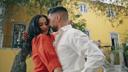 Hot couple dancers moving passionately on street close up. Artists performing