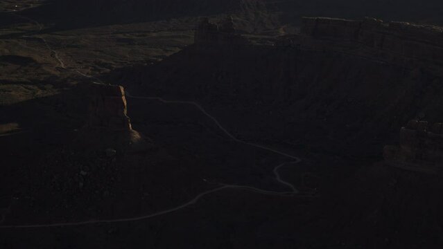 Aerial view of desert landscape at sunset