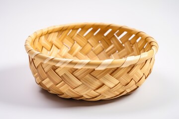 Handcrafted bamboo basket on white background woven from bamboo tray
