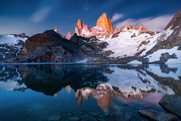 Laguna de los Tres during sunrise, Fitz Roy in beautiful red, perfect reflection in the water, near...
