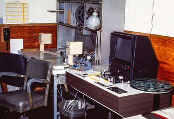 Vintage grainy film photograph of film edit bay work station.  Shot on slide film in March 1983.  