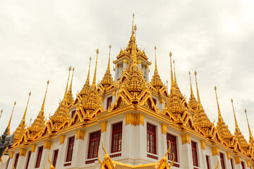 Fototapeta premium Wat Ratchanatdaram Woravihara, Loha Prasat temple at Bangkok city