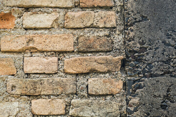 Ancient damaged brick wall surface.