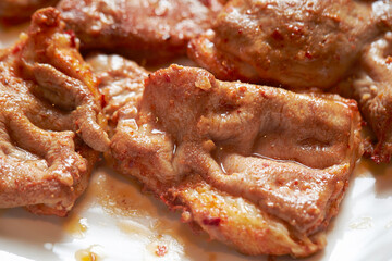 Grilled beef intestines on a plate