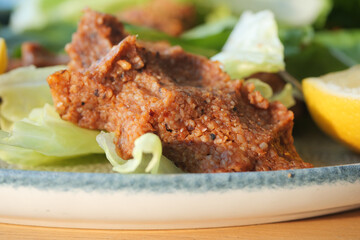 Raw meatballs or cig kofte. Traditional Turkish cuisine delicacies.