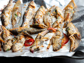 Seasoned fish on the grill