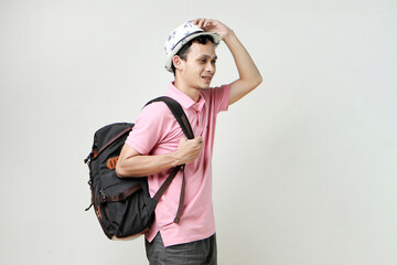 Asian man backpacker portrait. digital nomad and travelling concept. on isolated background