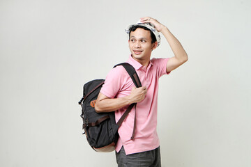 Asian man backpacker portrait. digital nomad and travelling concept. on isolated background