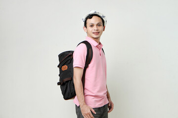 Asian man backpacker portrait. digital nomad and travelling concept. on isolated background