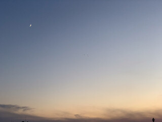 Into the Night, Setting Sun with Crescent Moon
